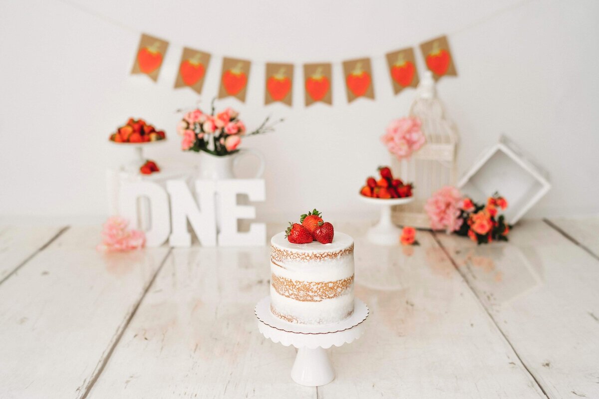 Custom birthday cake topper with strawberries