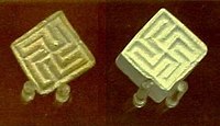 Swastika seals from Mohenjo-daro, Pakistan, of the Indus Valley civilisation, circa 2,100 – 1,750 BCE, preserved at the British Museum[87]