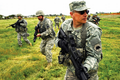 Members of the California State Military Reserve perform squad drills.