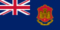 Dark blue flag with red and yellow castle to right and Union Flag in top-left quarter.