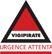 Vigipirate triangle with "Urgence Attentat" in red font