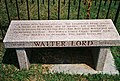 Walter Lord memorial bench at Green Mount Cemetery in Baltimore, Maryland, engraved with his books' titles