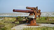 Rusted QF 4 inch mk IV gun without a gun shield on East Falkland