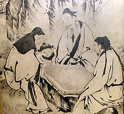 A screen painting depicting people of the Ming dynasty playing Go, by Kanō Eitoku