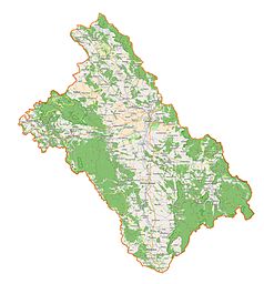 Mapa konturowa powiatu kłodzkiego, po lewej nieco u góry znajduje się punkt z opisem „Parafia Ewangelicko-Reformowanaw Pstrążnej”