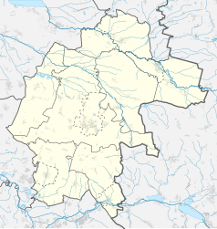 Mapa konturowa powiatu strzeleckiego, na dole znajduje się punkt z opisem „Synagoga w Ujeździe”