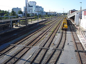 Island platform surrounded by railway tracks