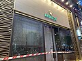 The glass of a watch shop on Russell Street was damaged by a pepper ball gun fired by the police.