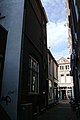 View from the Schoutensteeg, a side alley looking West towards the Barteljorisstraat.