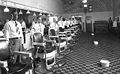 Staff of Draper's Barber Shop, Franklin Street, Martinsville, 1920. White bowls on floor are spittoons[194]