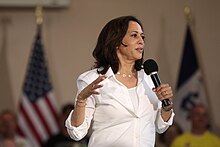 Kamala Harris speaking at a political event