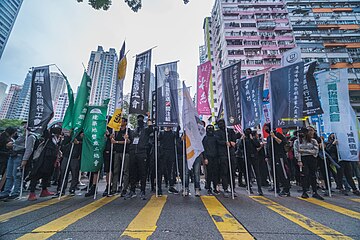 Protesters holding banners