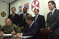 Image 58National Federation of Federal Employees officials sign a collective bargaining agreement with the U.S. 8th Army in October 2002.