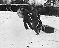 101st Airborne troops picking up air-dropped supplies during the siege.