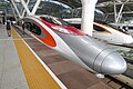 High-speed rail service by MTR launched on 23 September 2018. The image shows an MTR Vibrant Express train at Guangzhou South railway station