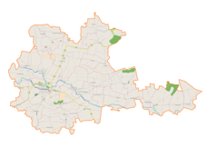 Mapa konturowa gminy Proszowice, blisko centrum na dole znajduje się punkt z opisem „Piekary”