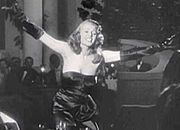 Rita Hayworth wearing the Gilda black dress in the "Put the Blame on Mame" number