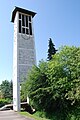 Turm der neuen Kirche von 1948, unter dem der Stüsslingerbach hindurchfliesst