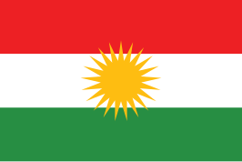 De vlag van Iraaks-Koerdistan die de Peshmerga gebruikt als hun embleem