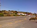 Houses and a petrol station in Waihola