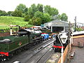 Bridgnorth yard in daylight with LMS Ivatt Class 4 no.43106, GWR 7800 Class 7812 and others.