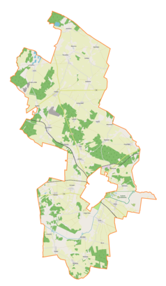 Mapa konturowa gminy wiejskiej Działdowo, u góry po lewej znajduje się owalna plamka nieco zaostrzona i wystająca na lewo w swoim dolnym rogu z opisem „Jezioro Grzybiny”