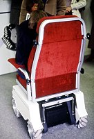 Wheelchair fitted with Mecanum wheels, taken at a trade fair in the early 1980s