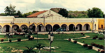 Arcade with pyramid in background