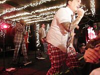 The Mighty Mighty Bosstones in their typical plaid outfits