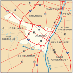 Map shows Albany on the west bank of the Hudson, surrounded by the towns of Colonie, Guilderland, and Bethlehem. Roads are also shown. Interstates 90, 87, and 787 pass through the city boundaries.