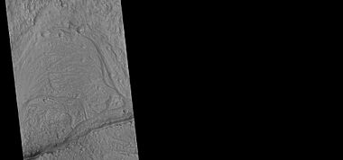 Stream meander and cutoff, as seen by HiRISE under HiWish program. This is part of a major drainage system in the Idaeus Fossae region.