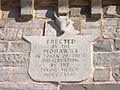 The tablet inscribed above the entrance to the church.