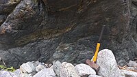 Amphibole epidote schist with slickensides from Benguet, Philippines, showing epidote lens