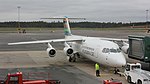 En Avro RJ100 från BRA flyg vid gate.