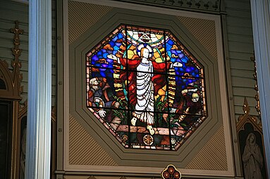 Stained glass at rear of church, depicting resurrection of Jesus, by Per Vigeland