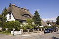 Ringleira de vivendas con colmado (thatched houses) preto de Stralsund na Illa de Rügen, Alemaña.