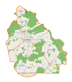 Mapa konturowa gminy Prochowice, blisko centrum na lewo znajduje się ikonka zamku z wieżą z opisem „Zamek w Prochowicach”