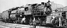 The Wootten firebox can be seen as the large construction just in front of the tender. Note the unusual position of the driver's cab. The fireman was left exposed between firebox and tender