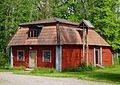 Tellado en mansarda nunha casa rural de Suecia.