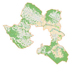 Mapa konturowa gminy wiejskiej Dynów, na dole znajduje się punkt z opisem „Dąbrówka Starzeńska”