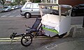 Kuŝbicikla taksio (pedicab) en Londono