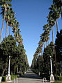 A walkway in front of the old hotel