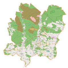 Mapa konturowa powiatu bolesławieckiego, na dole nieco na prawo znajduje się punkt z opisem „Zamek w Warcie Bolesławieckiej”