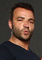 Nick E. Tarabay interpreta Digger Harkness