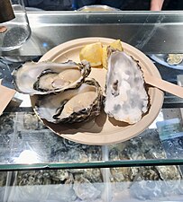 Raw "Fine de Claire" oysters at Mercado de San Miguel in Madrid