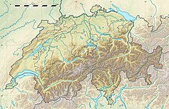 Mapa konturowa Szwajcarii, na dole nieco na lewo znajduje się czarny trójkącik z opisem „Dent d’Hérens”