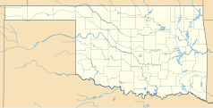 Mapa konturowa Oklahomy, blisko centrum na prawo znajduje się punkt z opisem „Dibble”