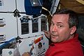 Mission Specialist Michael Foreman on the mid-deck of Atlantis