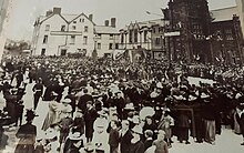 The town square of millom, filled with around 200 people. This photo was taken at the peak of Millom's significance, when it was a flourishing mining town.