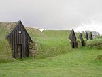 Keldur Earth covered homes with grass growing on the top